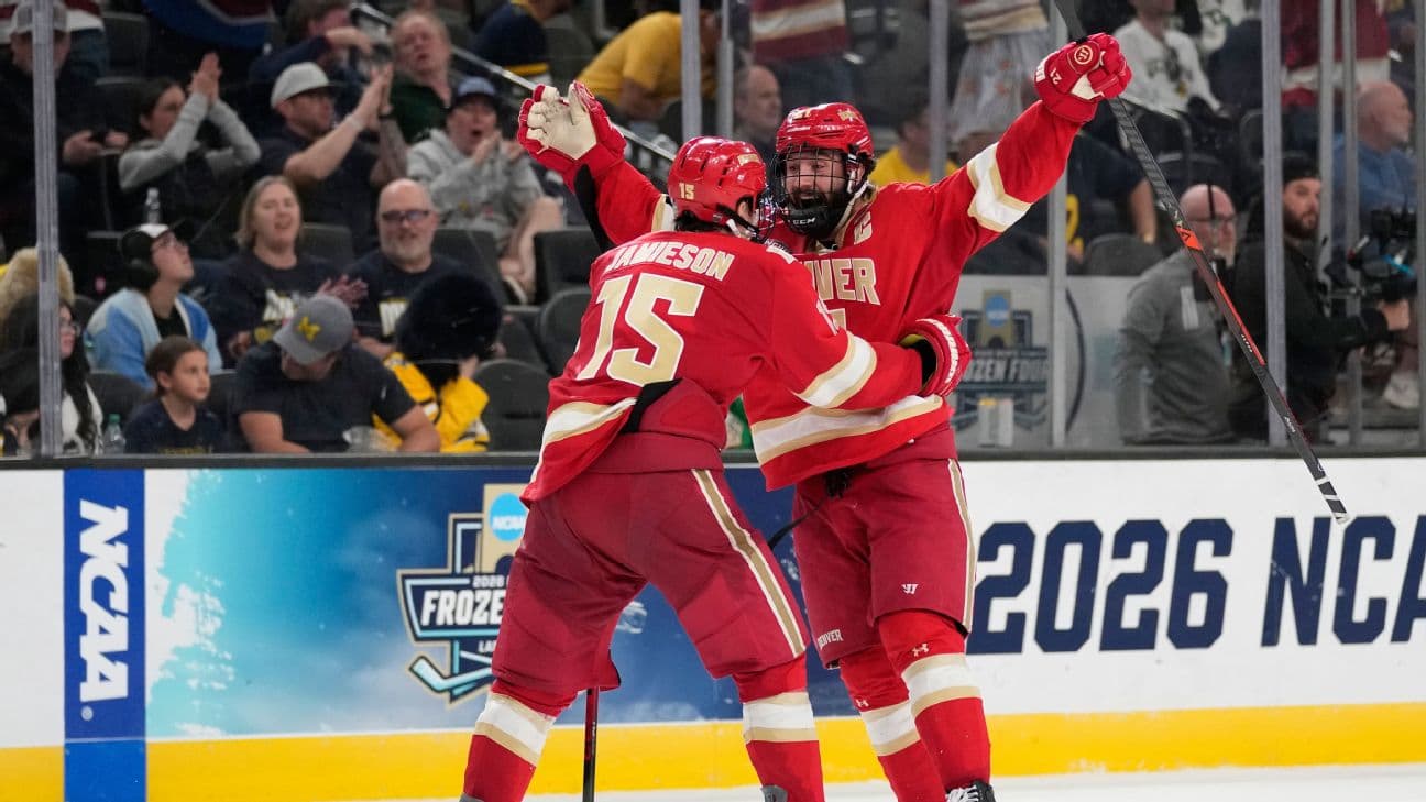 Denver Pioneers Kent Anderson celebrates game-winning goal in double overtime against Michigan