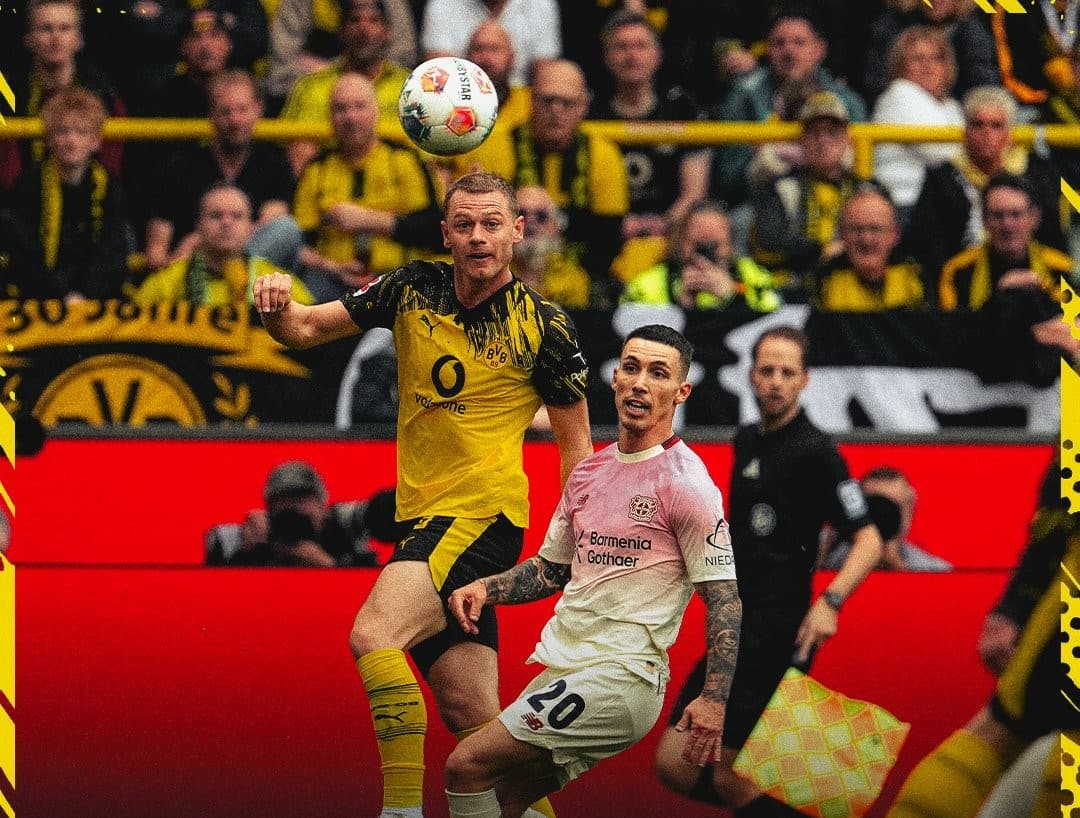 Robert Andrich celebrates his stunning goal for Bayer Leverkusen against Dortmund at Signal Iduna Park