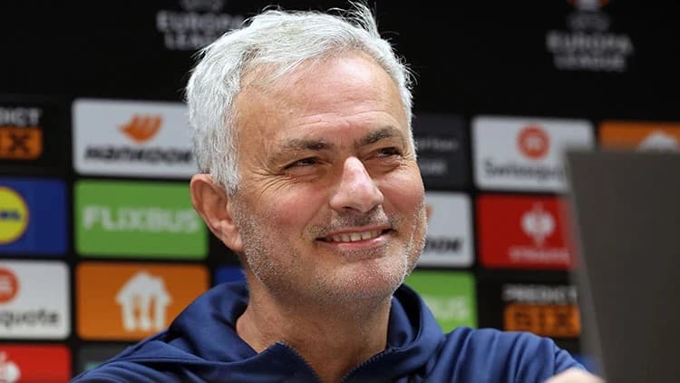 Jose Mourinho standing in front of Santiago Bernabeu stadium as new Real Madrid head coach